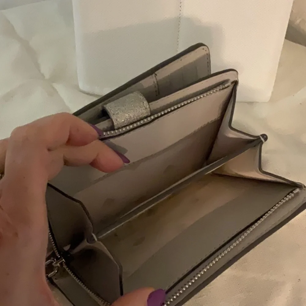 Kate Spade Glimmer Glitter Bifold Wallet, Silver, 5.5”x3.5”x1” - Picture 8 of 12